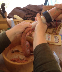 hand stuffing sausage